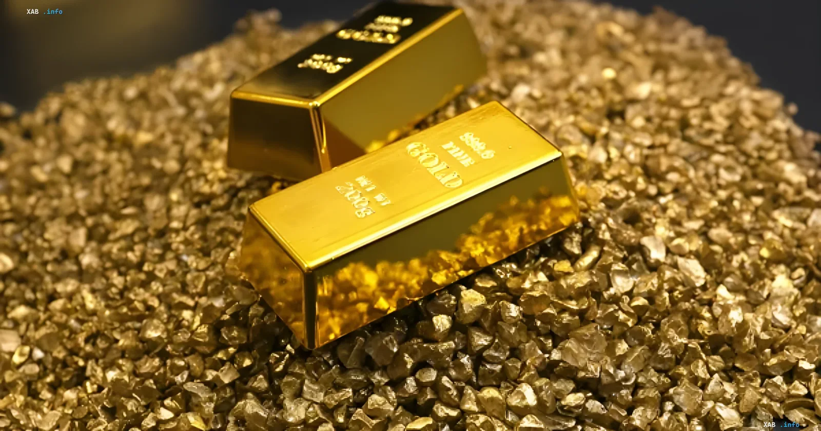 Gold bars on golden sand — symbol of gold price drop to two-month low due to US jobs data and Middle East conflict
