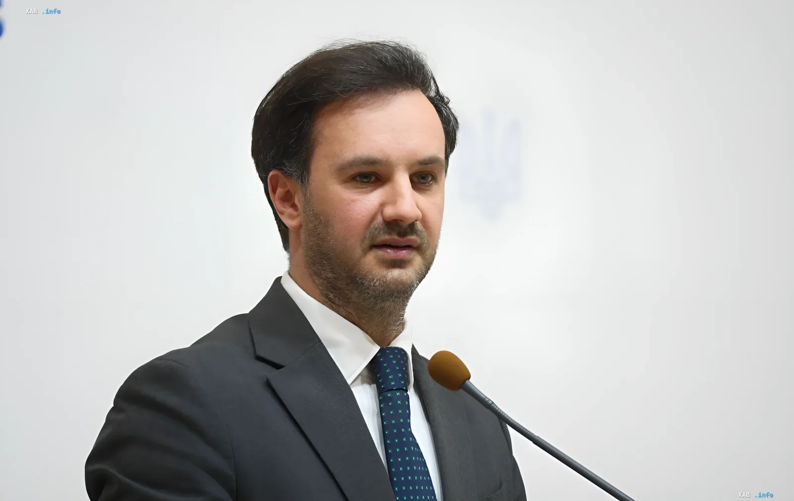 Georgiy Tikhy speaks at a press conference discussing historical disputes with Poland