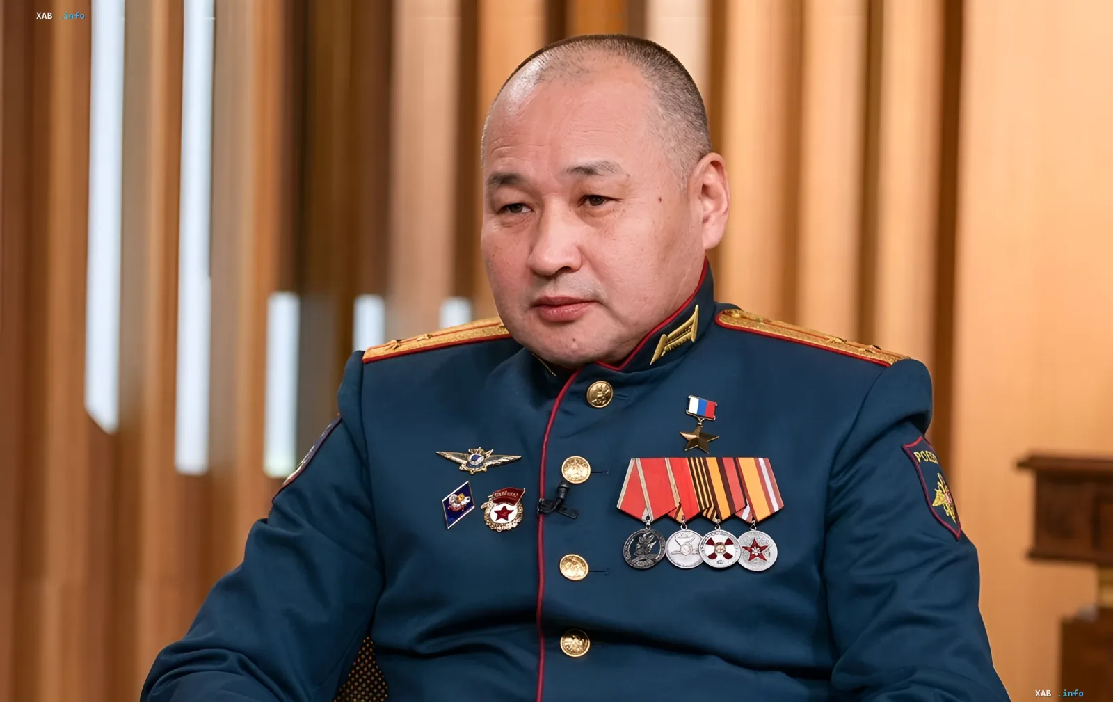 Hero of Russia Naran Ocher-Goryaev in military uniform with medals, discussing the assault on Seversk