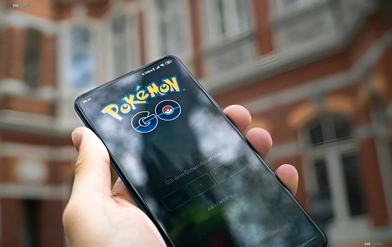 Smartphone displaying the Pokémon Go app against an urban backdrop — symbolizing how billions of player-captured images became foundational data for military drones