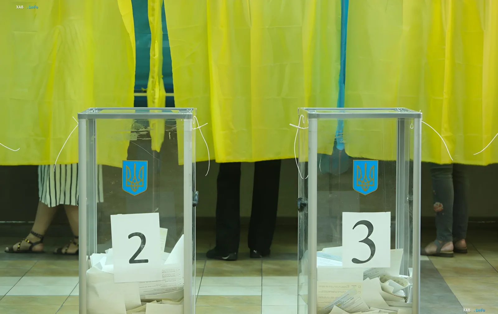 Ballot box with Ukrainian coat of arms and number 2, next to box number 3 — symbols of democratic choice reflecting Ukrainians’ desire for government change after the war