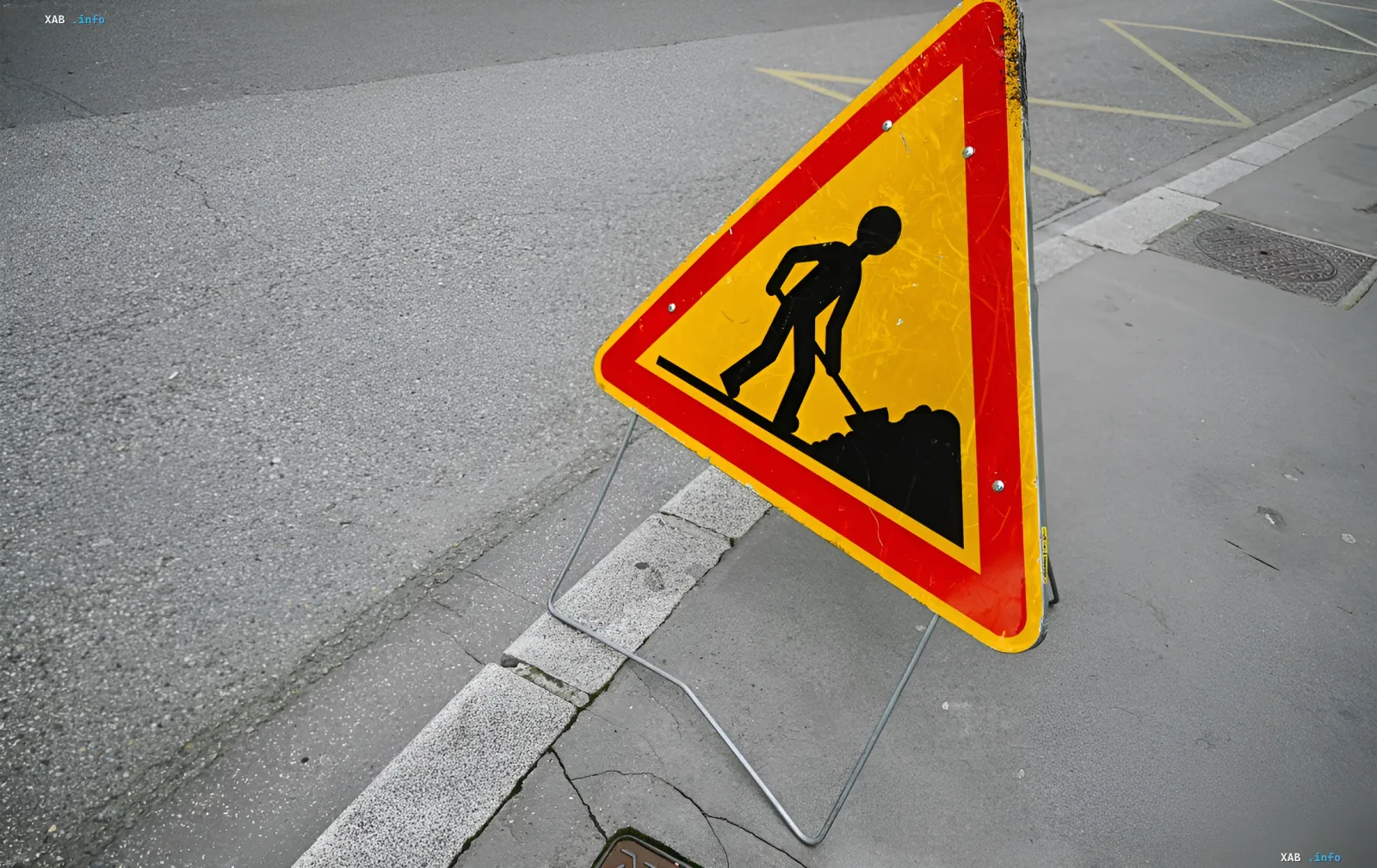 Warning road sign indicating roadworks on Hostomel Highway in Kyiv, symbolizing partial traffic restrictions starting June 18
