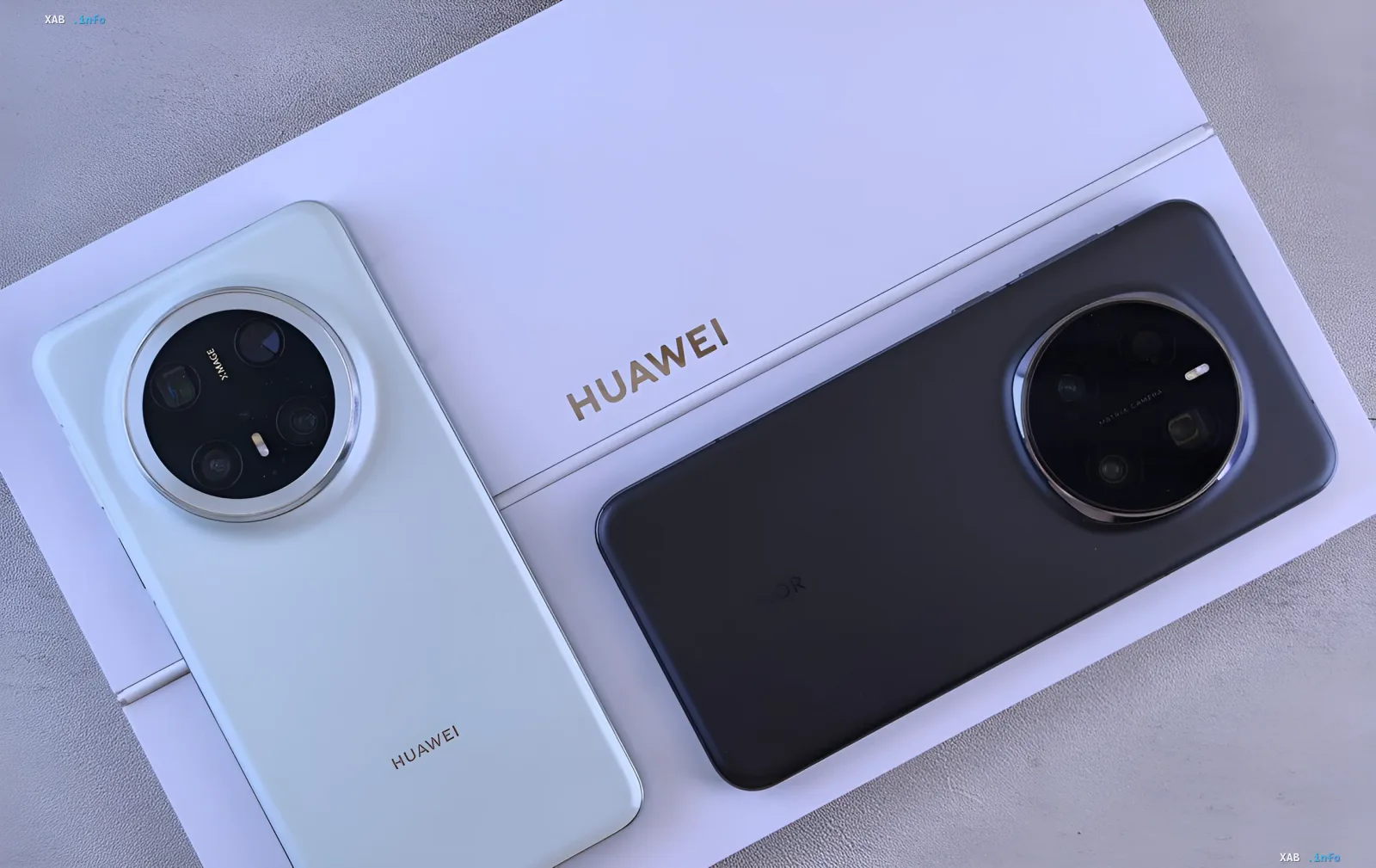 Смартфоны Huawei с круглой камерой на фоне упаковки с логотипом Huawei