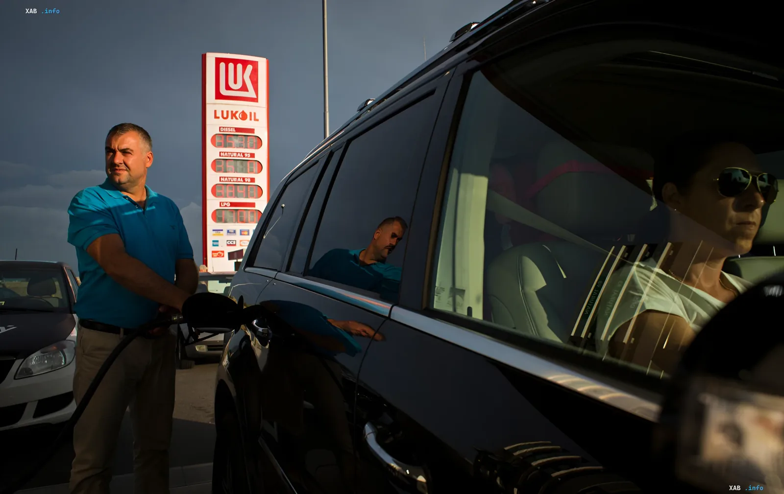 Car refueling at Lukoil gas station amid fuel shortage in Russia