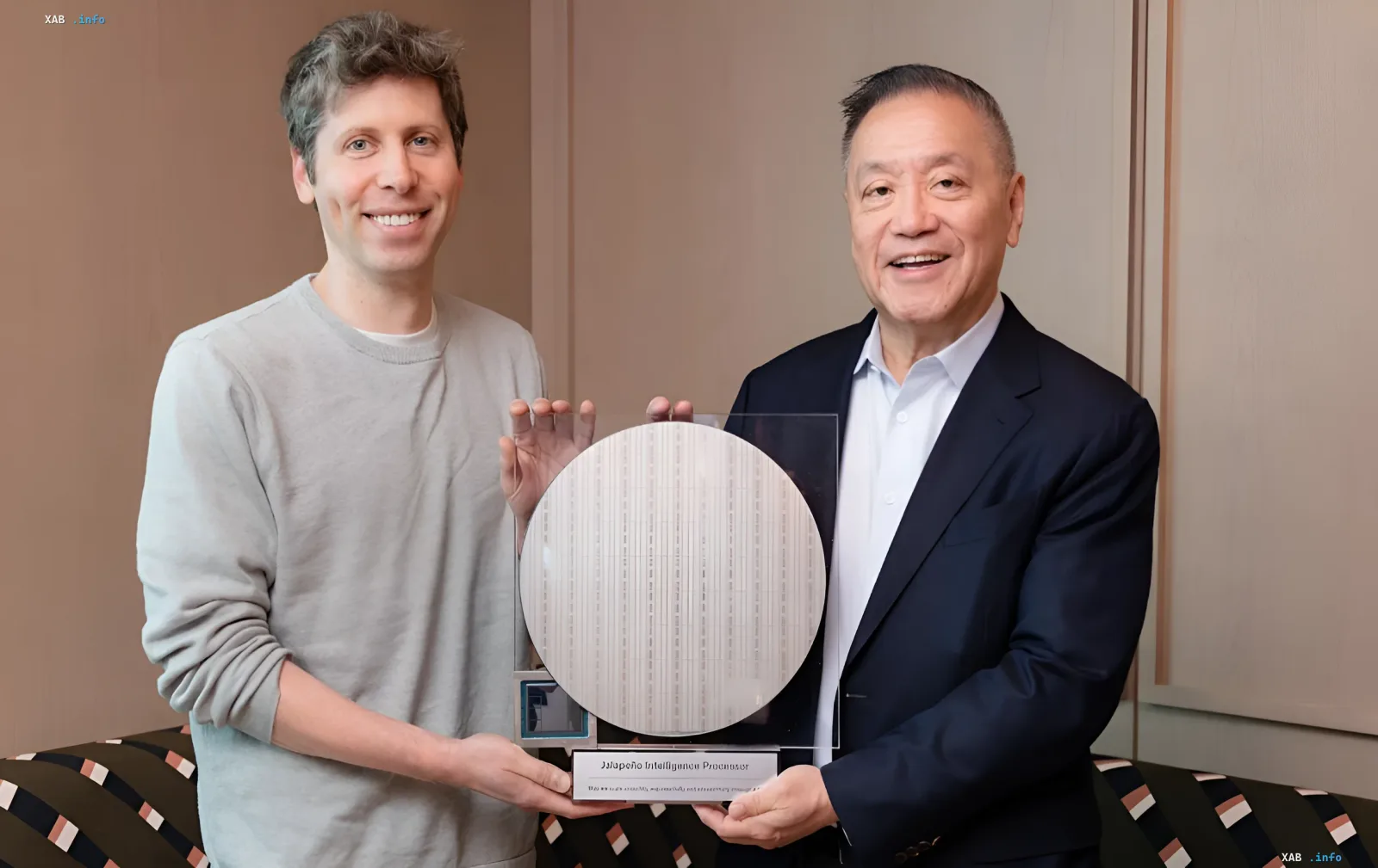 Elon Musk and an OpenAI representative hold the Jalapeño processor crystal, symbolizing the beginning of the era of full control over AI infrastructure