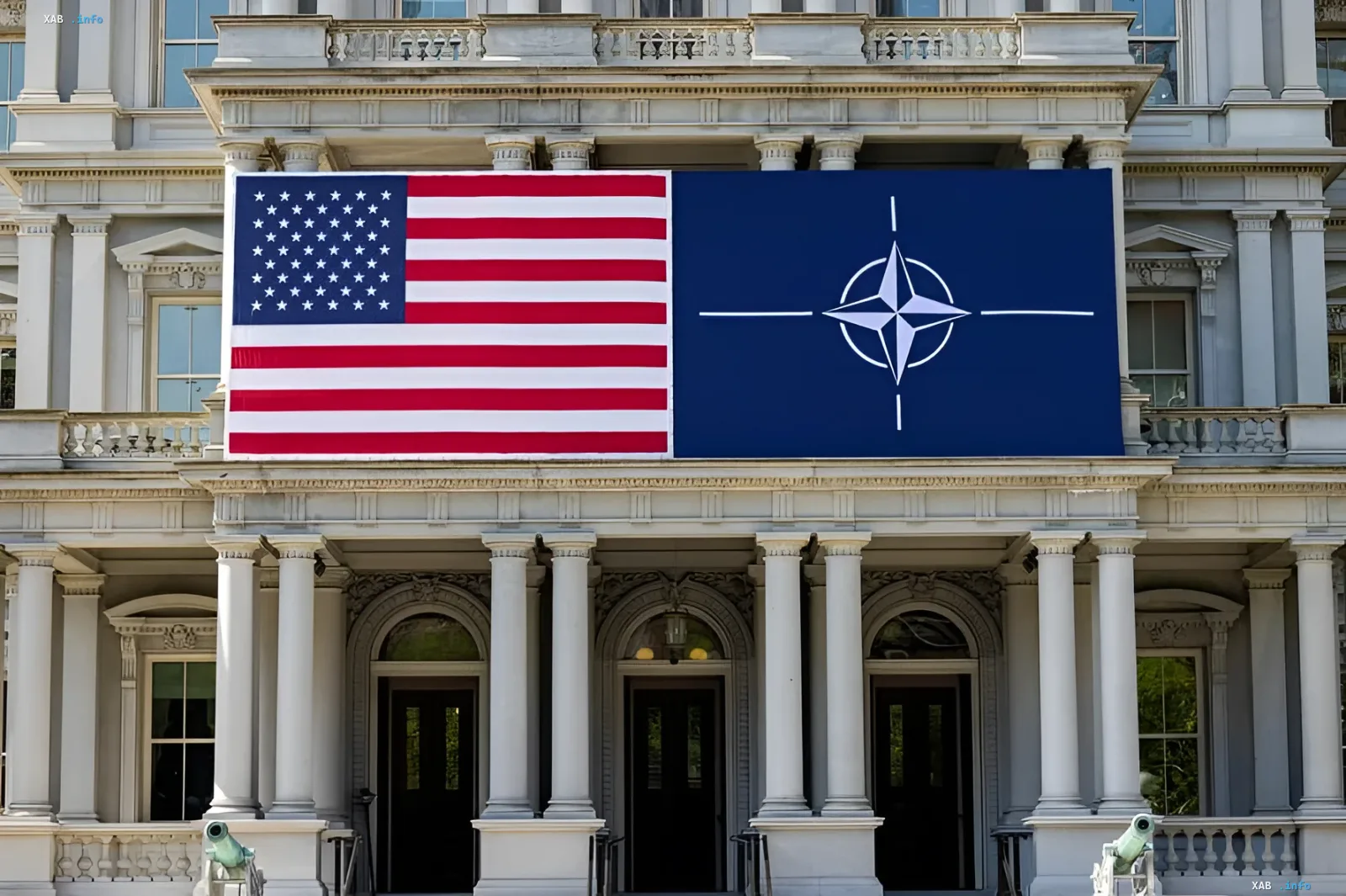 US flag and NATO flag on the facade of a building, symbolizing protection and power projection in the context of Mark Rutte redefining NATO's mission