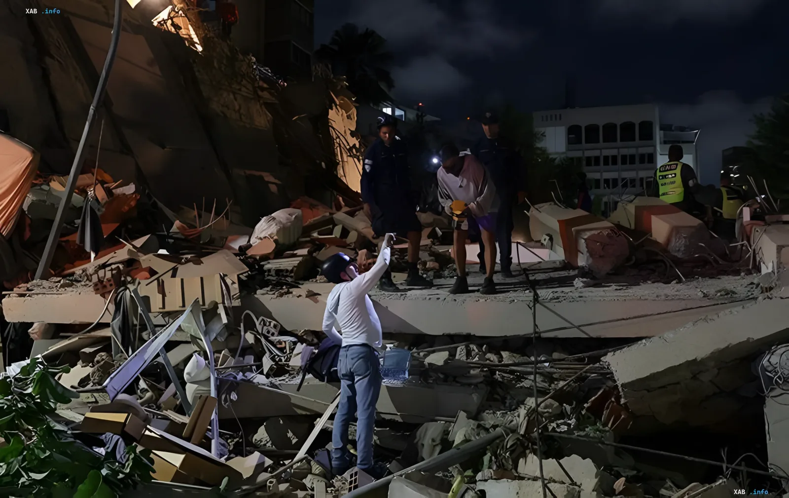 Rescue operations at night on the ruins of a collapsed building in Venezuela after a powerful earthquake
