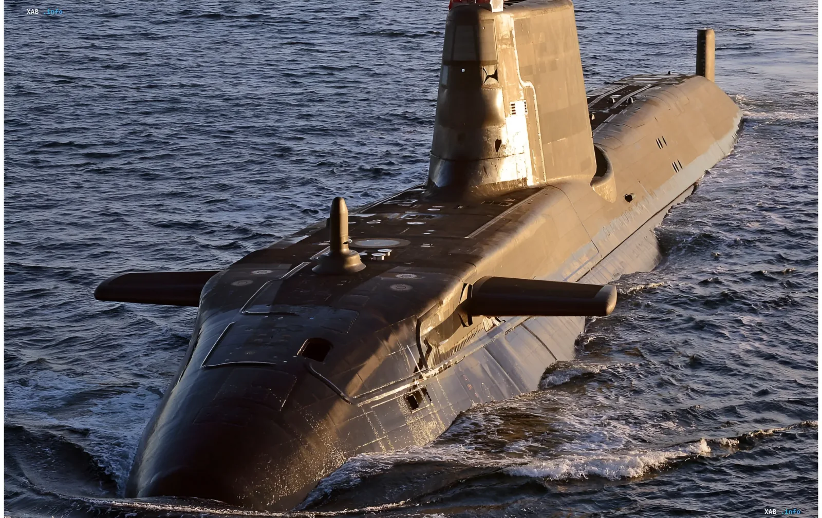 British Astute-class nuclear submarine on the sea surface — symbol of a paralyzed fleet due to repairs and staffing shortages