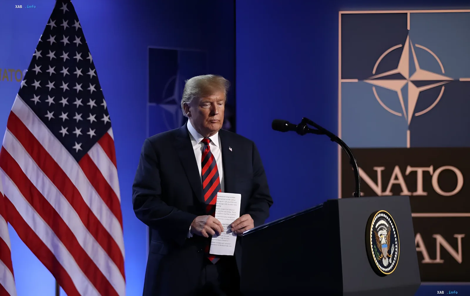 Donald Trump at a NATO podium with US flag — symbolizing potential US withdrawal and the nightmare scenario for Eastern Europe