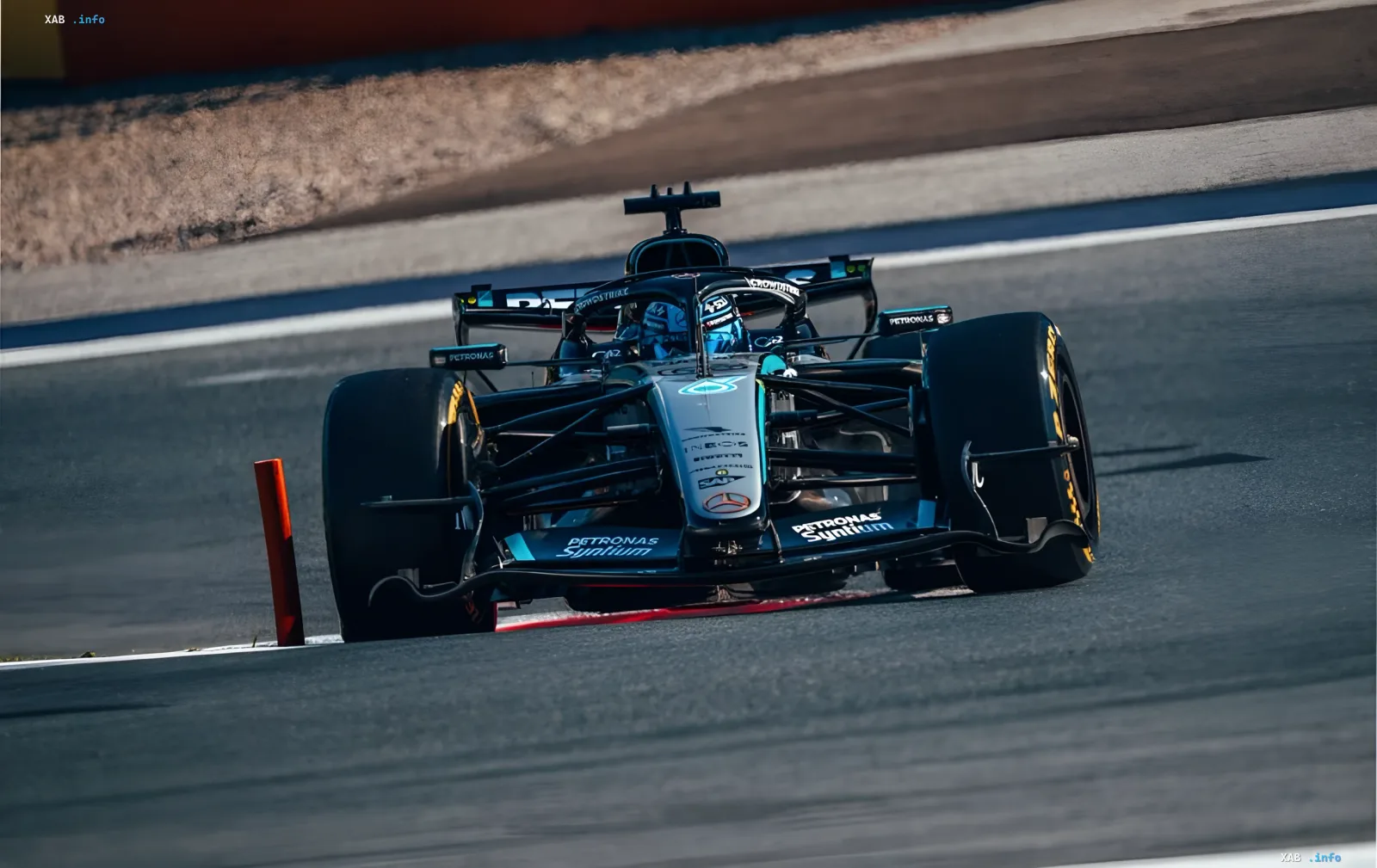 Racer George Russell on the Mercedes W17 car in a turn at the Red Bull Ring during the 2026 Austrian Grand Prix