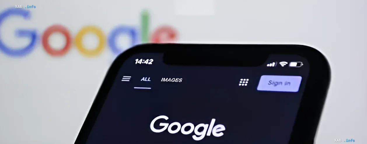 Смартфон с открытым приложением Google на экране, на фоне размытый логотип Google — иллюстрация к новости о том, что Google ограничил доступ Meta к моделям Gemini из-за дефицита чипов