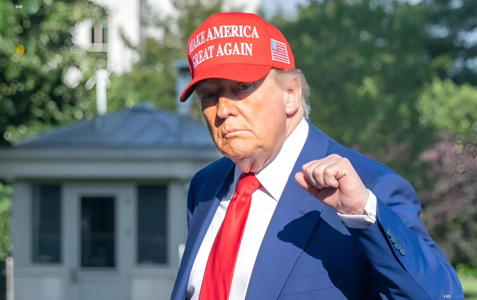 Donald Trump in a red MAGA cap and blue suit, symbolizing his crypto empire and record income in 2025