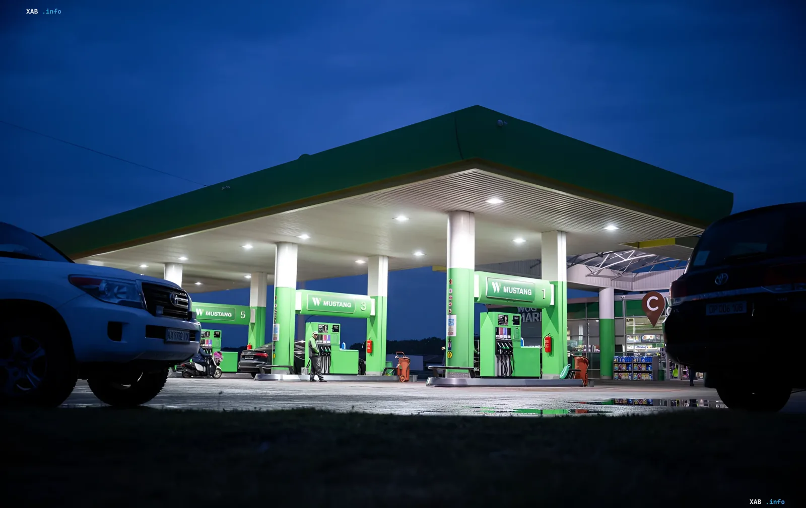 WOG gas station in Kyiv at night, closed due to security threat after heavy shelling