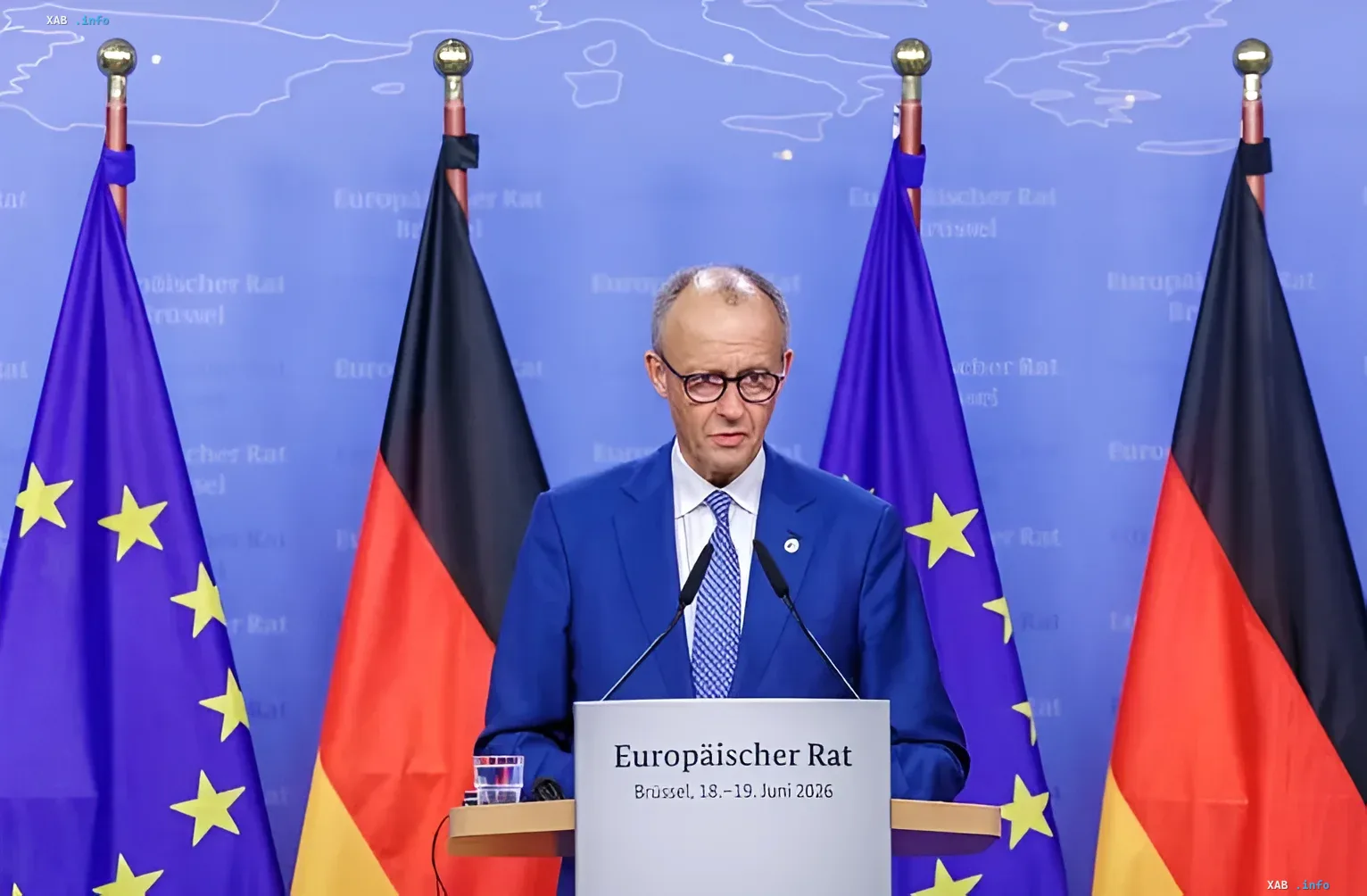 Oliver Scholz speaks at a European Council press conference in Brussels, symbolizing Germany's stance on reducing the EU budget