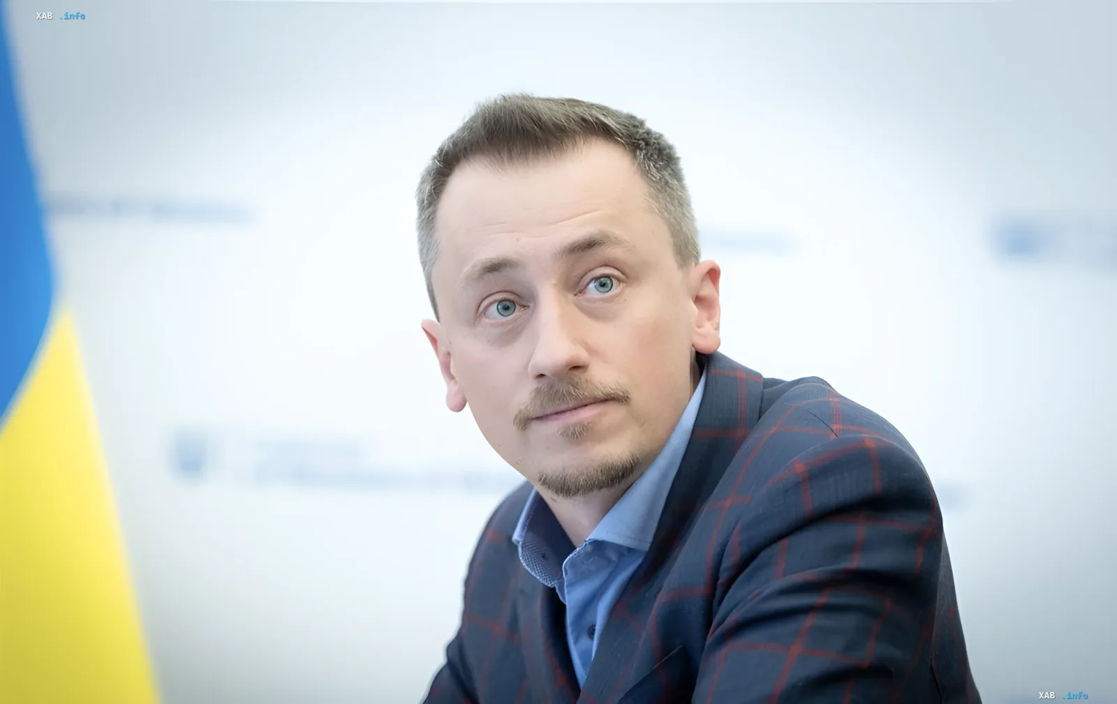 Ukrainian Defense Minister Alexey Reznikov against the Ukrainian flag — discussing new conscription exemption rules