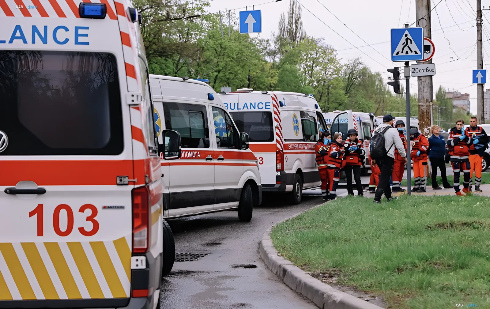 Medical teams and rescuers at the scene of a fatal bus crash at a railroad crossing in Rivne region