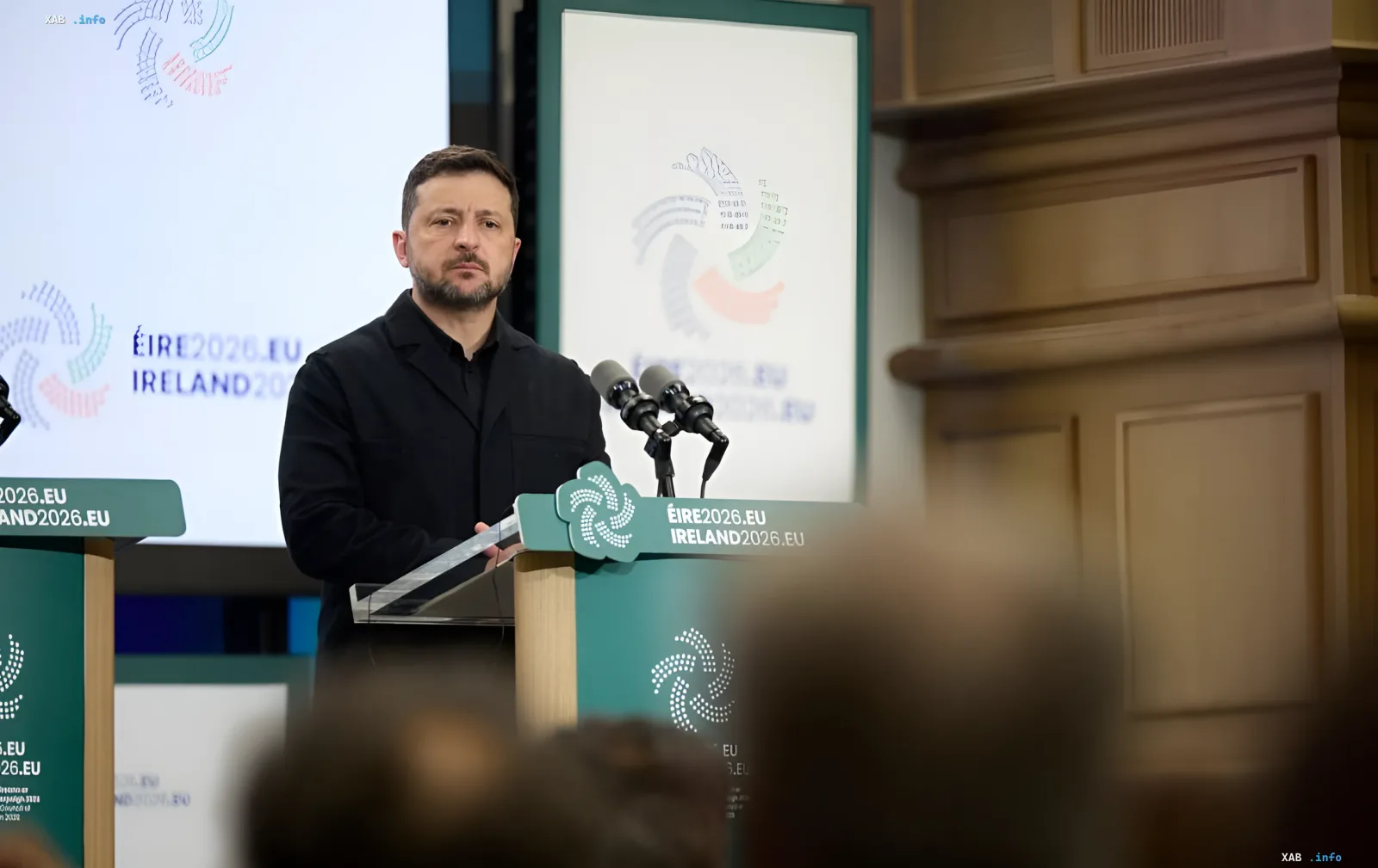 Ukrainian President Volodymyr Zelenskyy speaks at a podium with the Éire2026.eu logo, discussing a strategic partnership with Ireland in the field of drone technology.