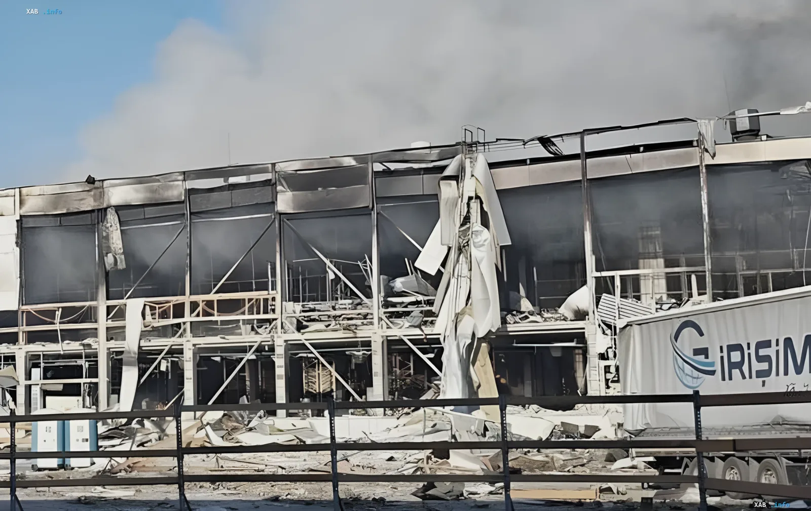 Destroyed BookChef warehouse in Kyiv after night airstrike: burnt walls, collapsed structures and smoke rising above the building
