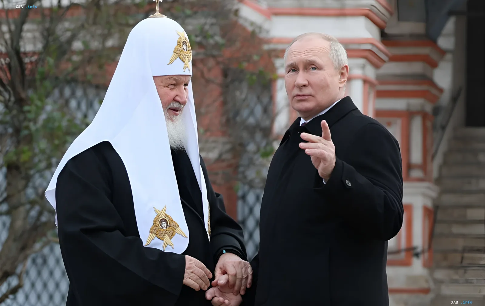 Patriarch Kirill and Vladimir Putin at a meeting, discussing issues related to sanctions and international politics