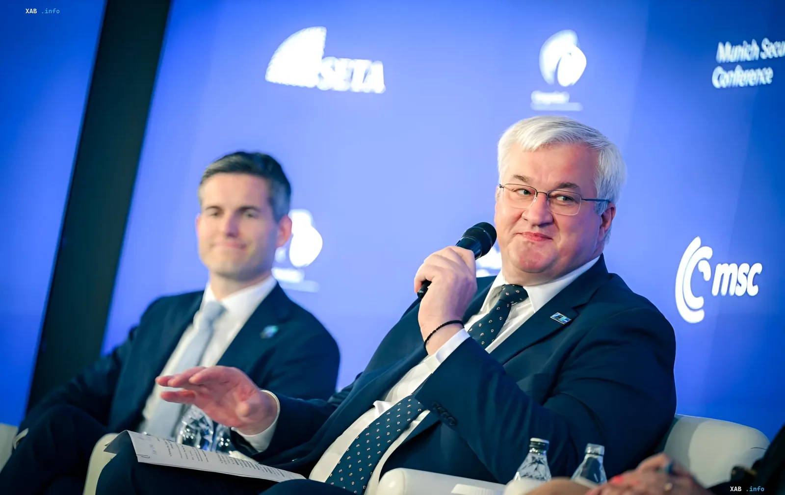 Ukrainian Foreign Minister Dmytro Kuleba at the Munich Security Conference, announcing a visit to China and calling for peace