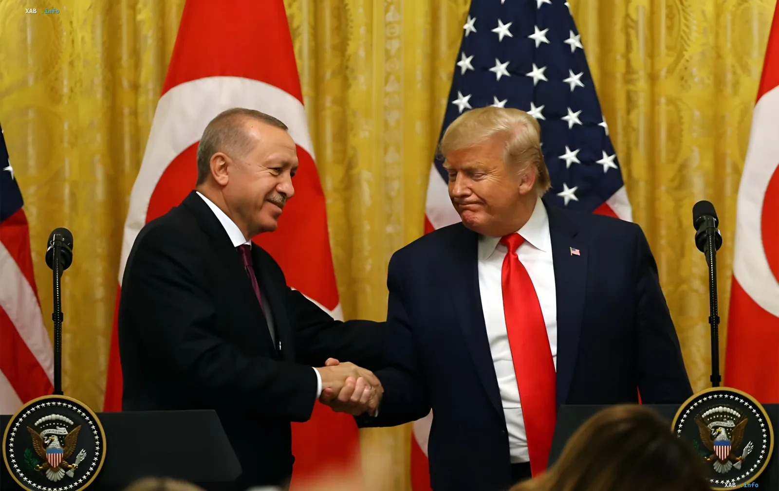 Donald Trump and Recep Tayyip Erdoğan shake hands at a press conference in Ankara, discussing the lifting of US sanctions on Turkey over S-400