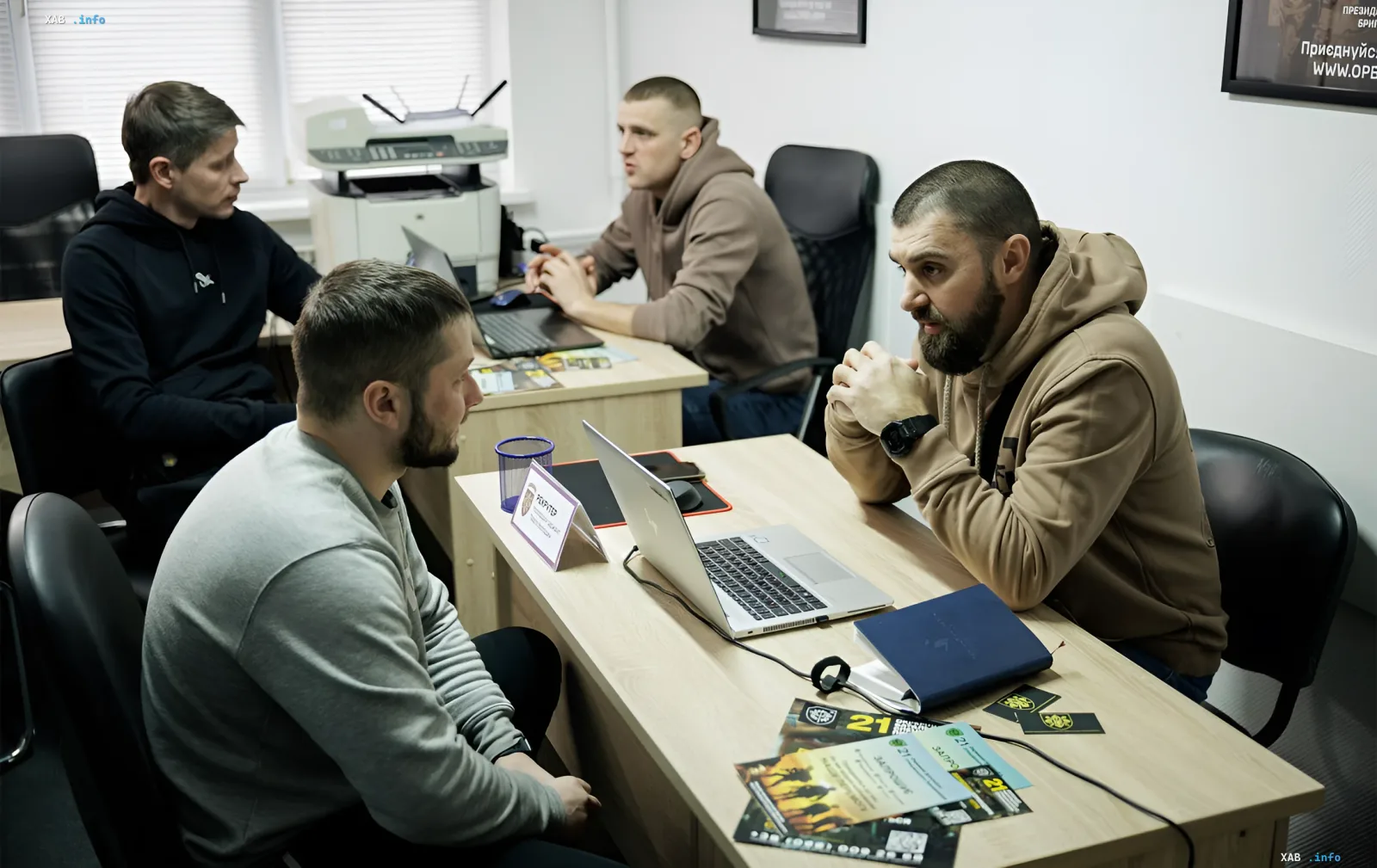 Ukrainian Armed Forces recruiters interviewing a candidate to match his civilian skills with a military role