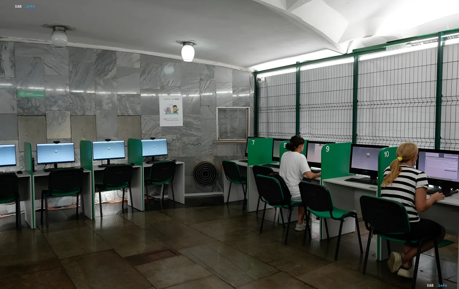 Driver's license applicants taking a computerized test at a training center in Ukraine