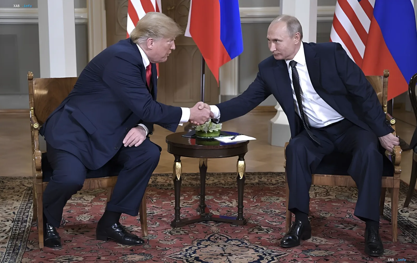 Donald Trump and Vladimir Putin shake hands during a meeting, with flags of the USA and Russia in the background, discussing the possibility of ending the war