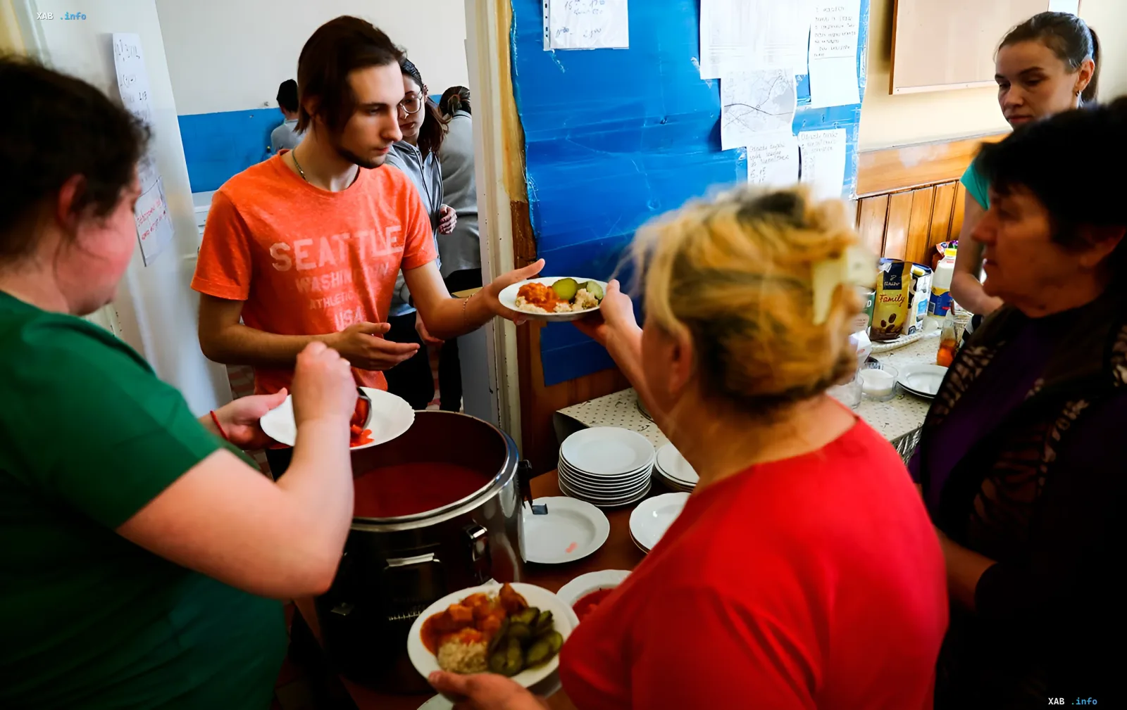 Refugees receive free food in a canteen in the UK amid new rules for returning accommodation costs