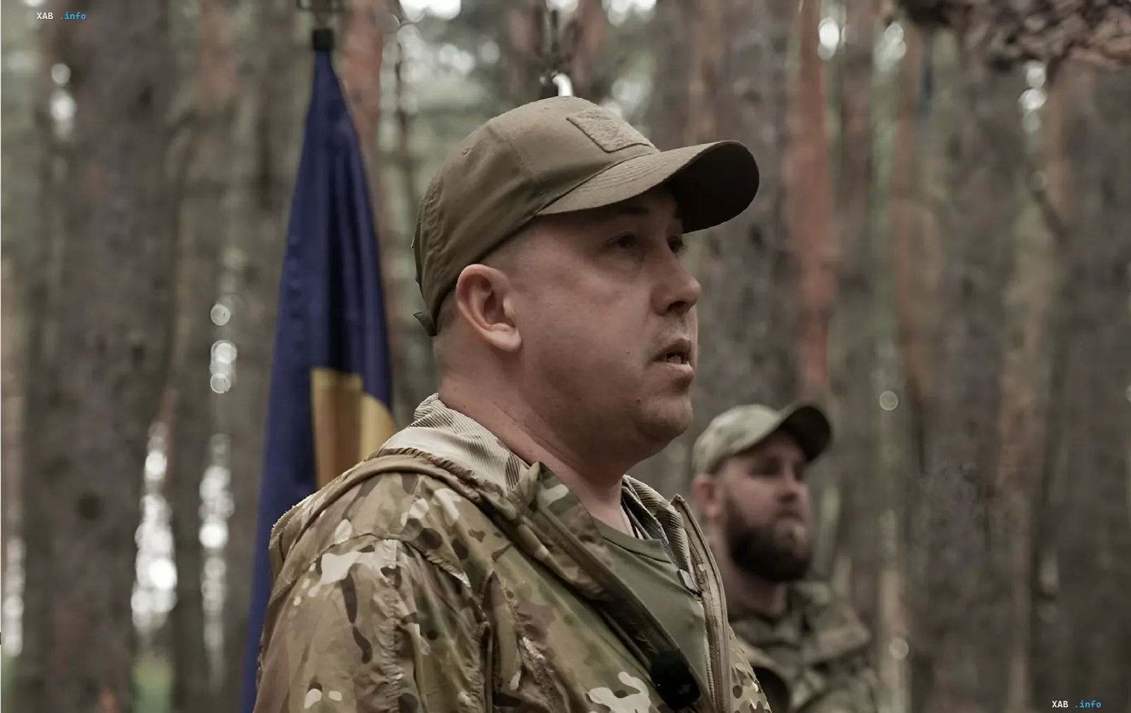 Станислав Лучанов, командир 155-й бригады, в камуфляжной форме и кепке на фоне леса