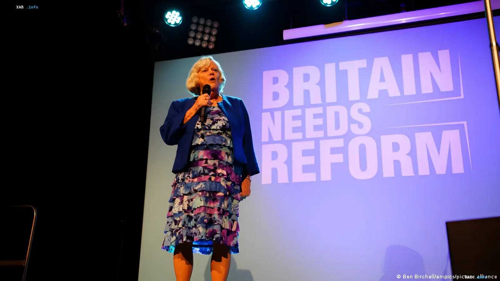 Ann Widdecombe speaking at a political rally with the slogan 'Britain Needs Reform' — victim of a murder under investigation for political motive and terrorism