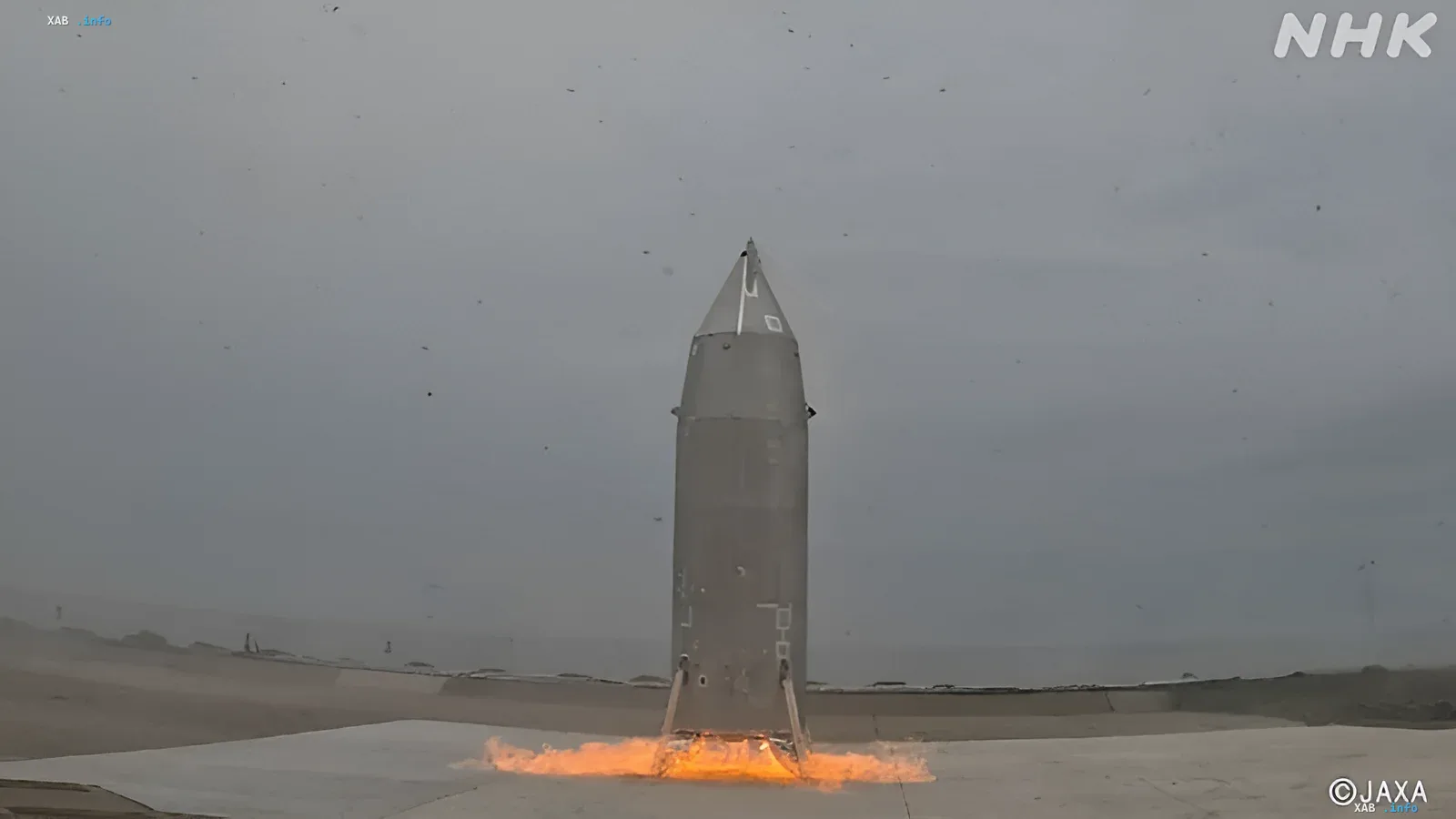 Прототип многоразовой ракеты RV-X Японии приземляется на посадочную платформу с работающими двигателями, демонстрируя успешное испытание технологии снижения стоимости космических запусков