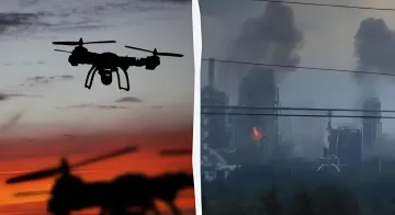 Drone against sunset and smoke from fire at industrial facility in Russia