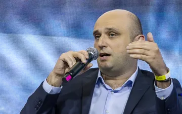 Олександр Кравченко, колишній партнер McKinsey, виступає з промовою на заході, обговорюючи можливе призначення на посаду міністра економіки України