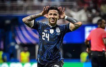Argentine footballer in national team jersey with number 24 celebrating a goal against stadium backdrop, symbolizing emotional context ahead of political scandal at WC-2026
