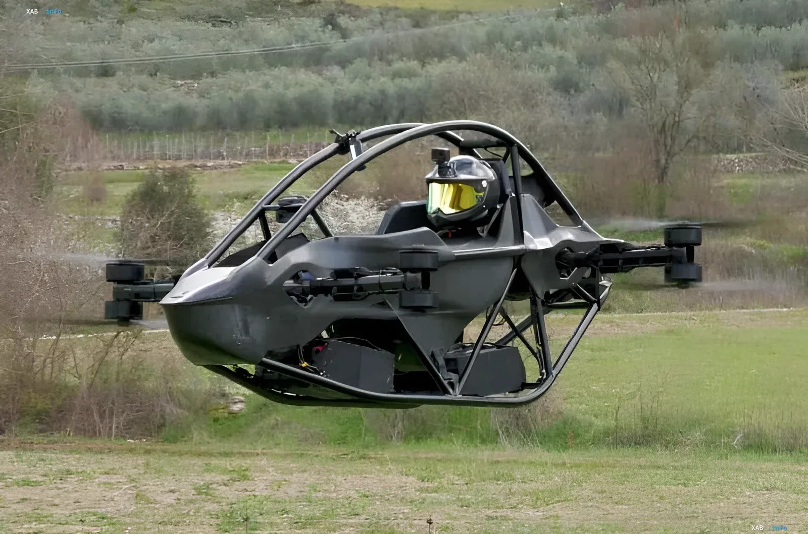 Brave1 combat aerobike with a helmeted pilot taking off in a field, showcasing innovative infantry delivery tactics