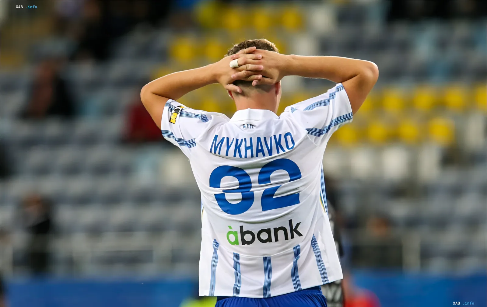 Dynamo player with the surname Mykhavko on the back (№92) holds his head in disappointment after a draw with Universitatea