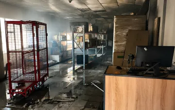 Destroyed Nova Poshta branch in Kramatorsk after KAB strike: burnt shelves, water on the floor, and damaged equipment