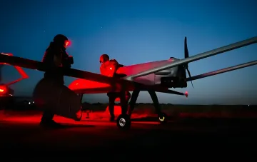 Ukrainian operators prepare the 'Molochka' drone for a night mission to strike Russia's shadow fleet