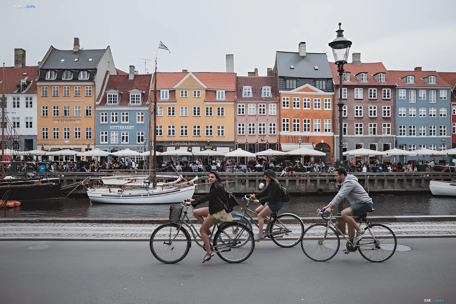 Cyclists ride along Nyhavn in Copenhagen with colorful buildings in the background, illustrating the priority of human life over data center energy consumption