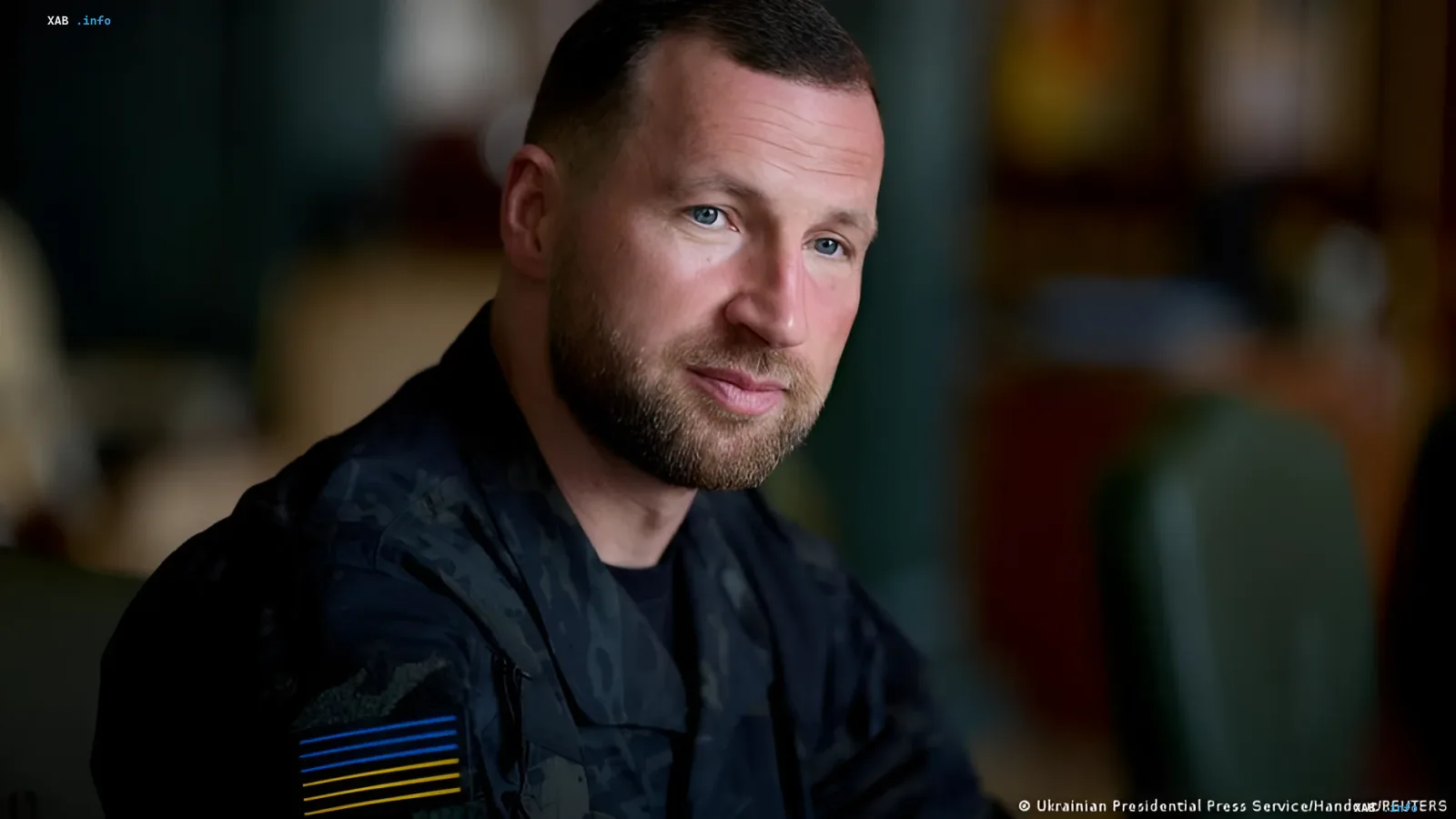 Евгений Хмара в военной форме с украинским флагом на рукаве, новый министр обороны Украины