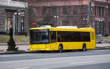 Yellow city bus route 114 in Kyiv, operating under revised schedule following nighttime incident