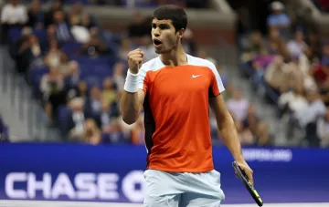 Carlos Alcaraz celebrates a victory at the Cincinnati tennis tournament, preparing for the US Open