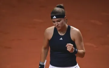 Karolina Muchova on court during an emotional moment, highlighting the significance of her current condition before surgery
