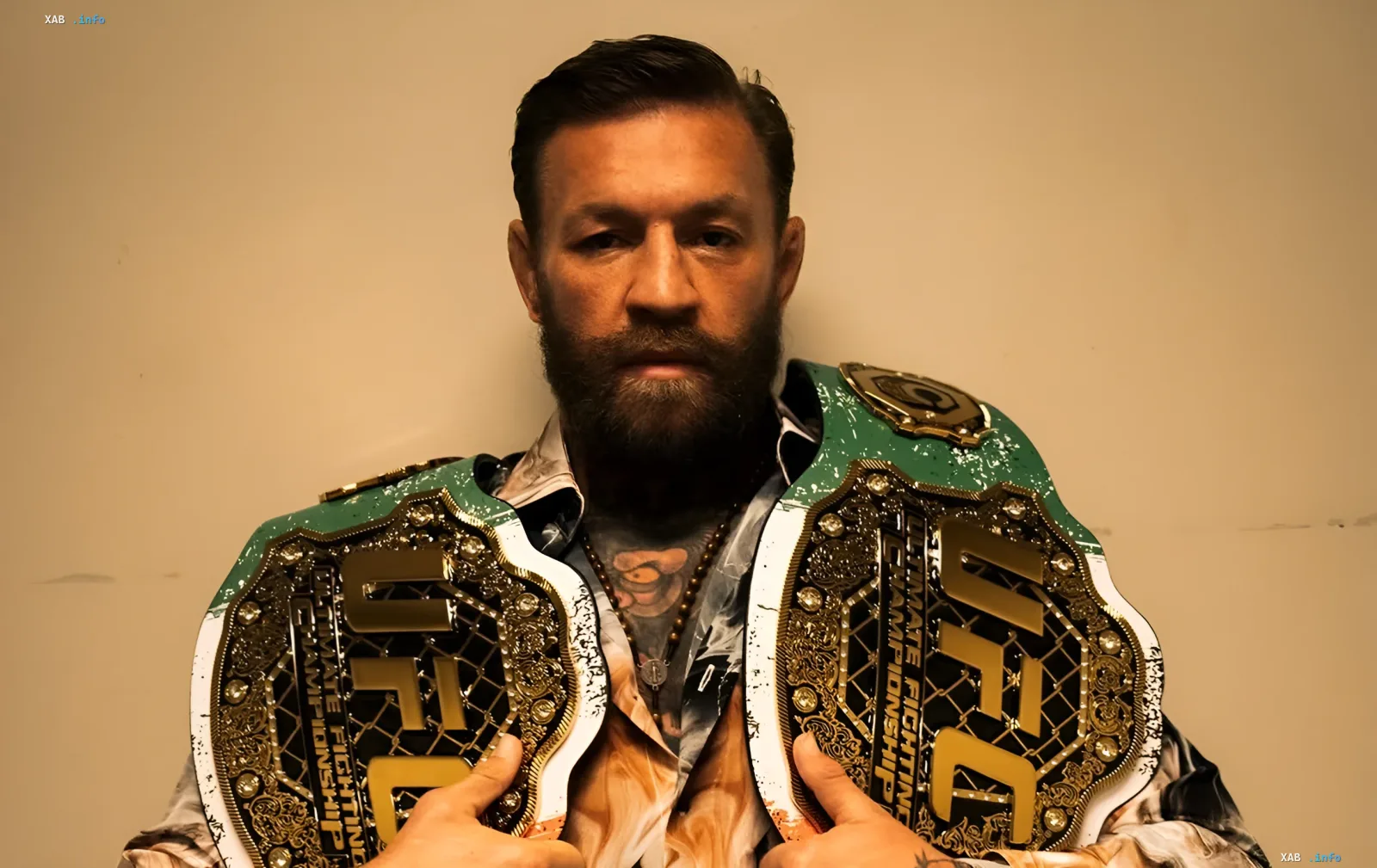 Conor McGregor with UFC belt in context of article about $100,000 bet for $3.6 million in 2026 World Cup final