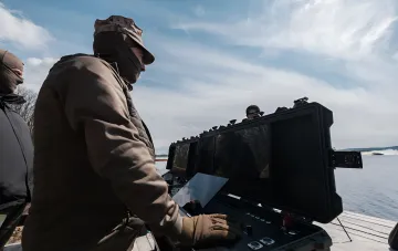 Ukrainian marines operate drone boats Barracuda via remote control on the banks of the Dnipro River