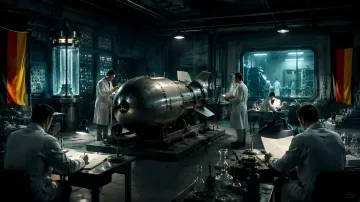 Wissenschaftler in einem Labor arbeiten an der Herstellung einer Atombombe, deutsche Flaggen im Hintergrund