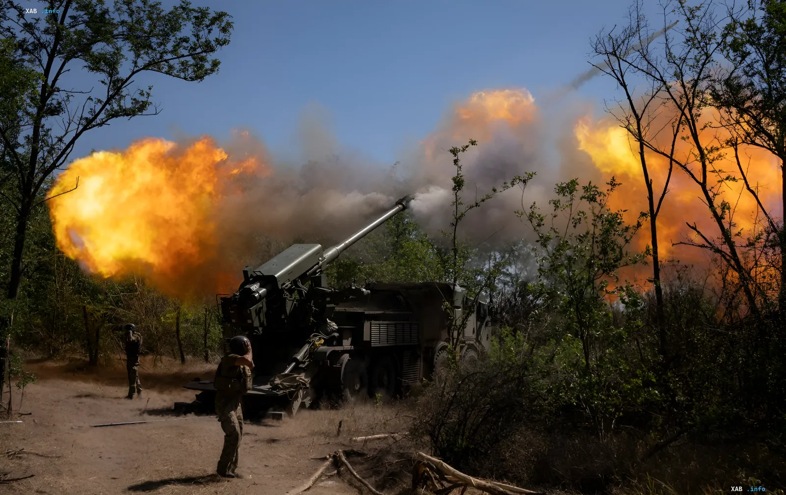 Russian self-propelled artillery unit (SPG) firing in a forested area