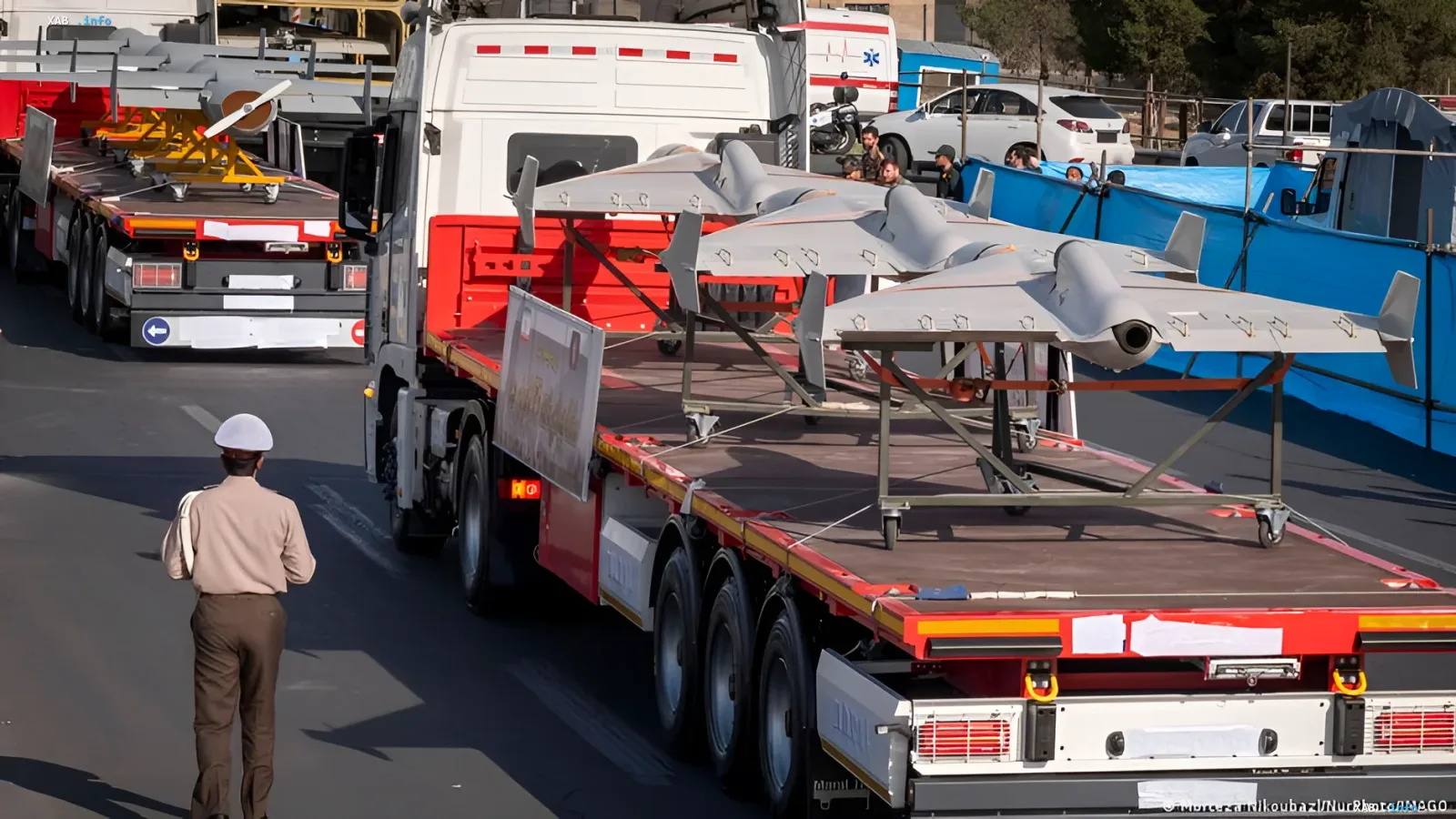 Transportation of drones on trucks in the Persian Gulf region, illustrating military supplies and Russia's role in the conflict