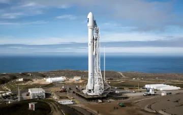 SpaceX Falcon 9 rocket on the launch pad, ready for launch, whose first stage will be used for a scientific experiment to collide with the Moon on August 5